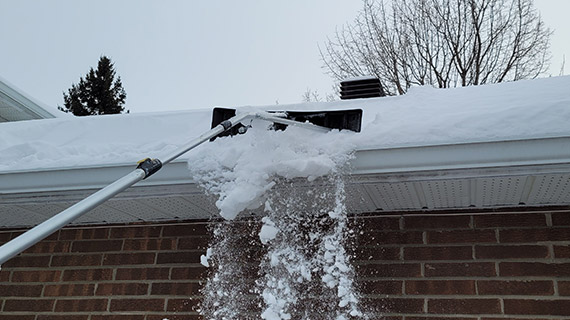 déneigement toiture rive-nord